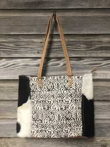 Cotton Rug and Cowhide Tote